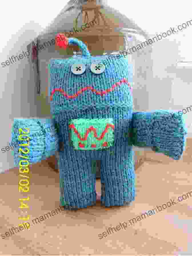 A Group Of Knitted Robots In Various Shapes And Sizes. Robot Knit Pattern Amy Gaines